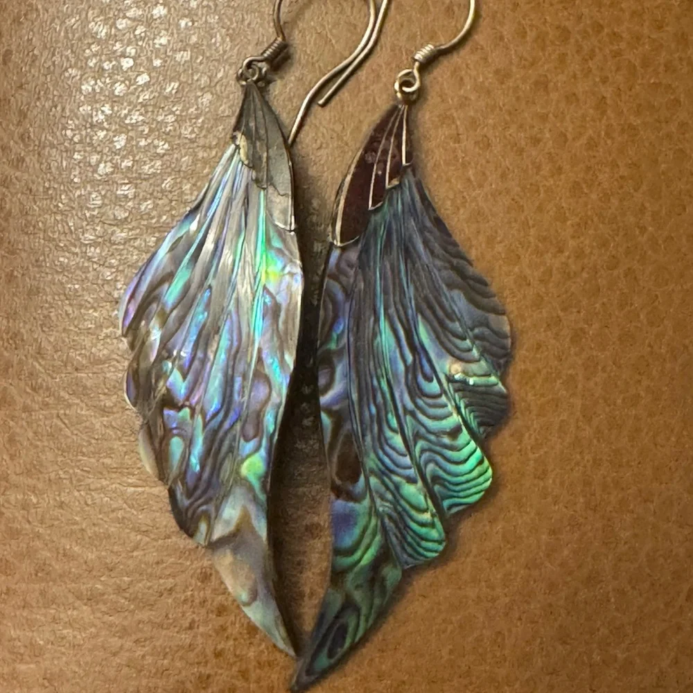 Beautiful abalone and silver plate feather earrings